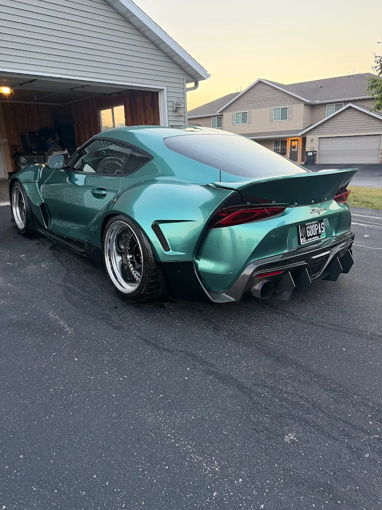 Green Toyota Supra with glossy paint after a Lux Detail service